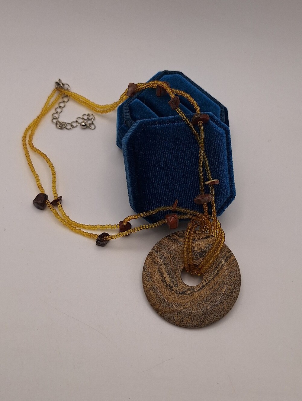 Gold Beaded Multi-Strand Necklace with Stone Donut Pendant